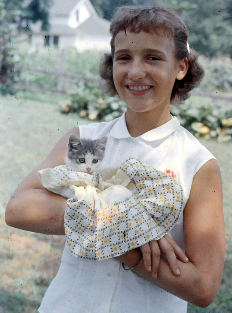 Photo of Judy with pet kitten