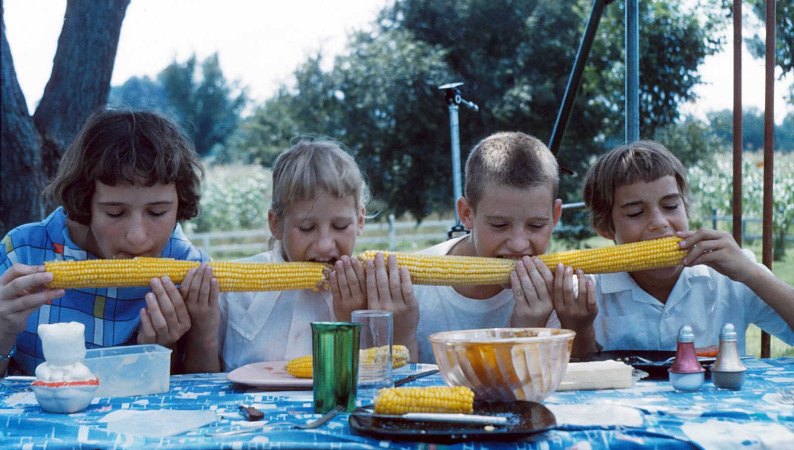 Photo of kids with "giant" ear of corn